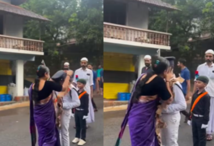 Heartwarming Gesture: Hindu Woman Adorns Muslim Child with a Currency Garland during ‘Milad Un Nabi’ Rally – Watch the Video