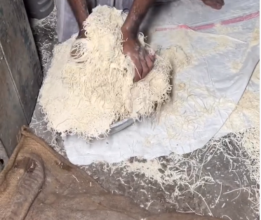 Watch with disgust as noodles are produced in a Kolkata factory